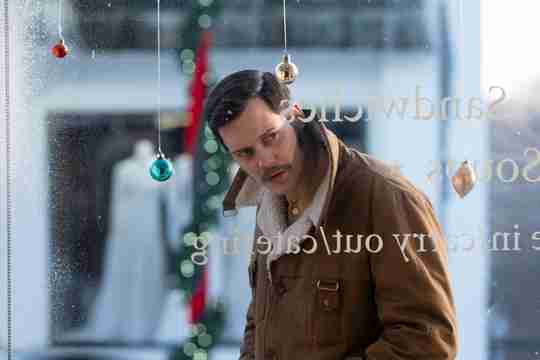 Dead Man's Wire - Bill Skarsgård as Tony Kiritsis Looking Through the Window