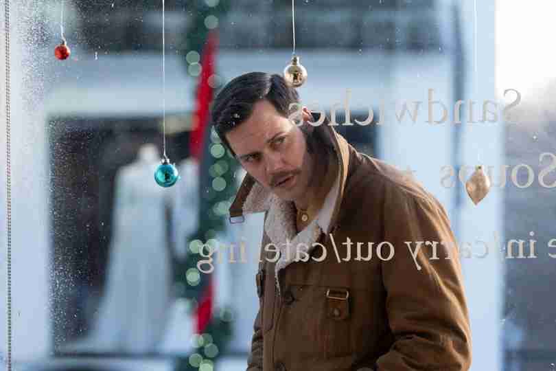 Dead Man's Wire - Bill Skarsgård as Tony Kiritsis Looking Through the Window