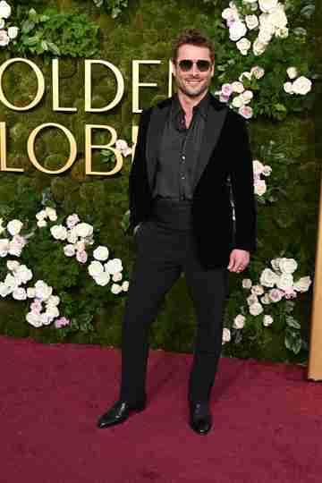 Glen Powell at the 82nd Annual Golden Globes Red Carpet