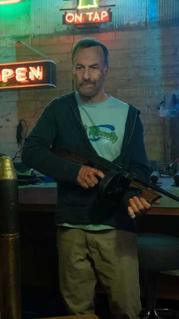 Nobody 2 - Bob Odenkirk as Hutch Mansell in a Neon-lit Underground Hideout