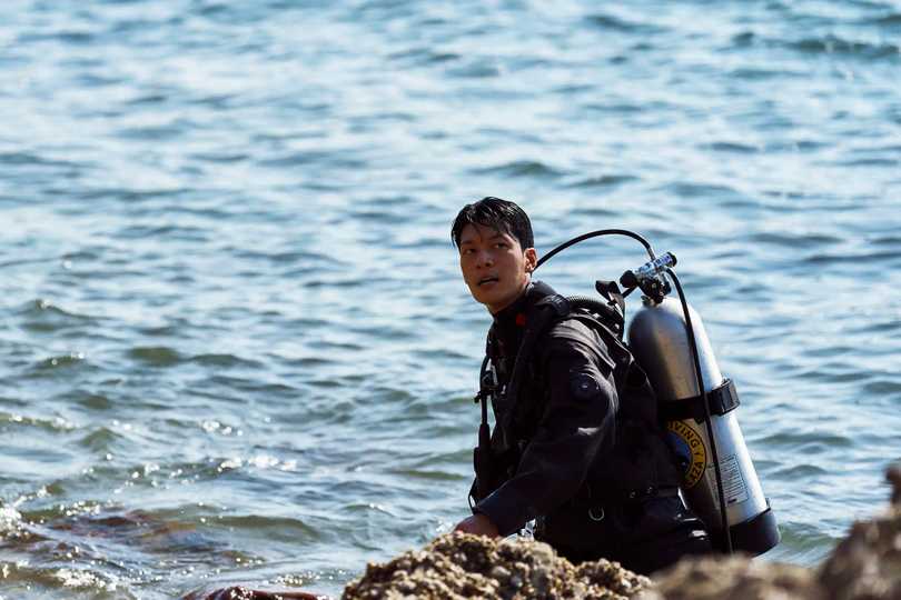 Squid Game Season 3 - Wi Ha-jun at a Rocky Shoreline