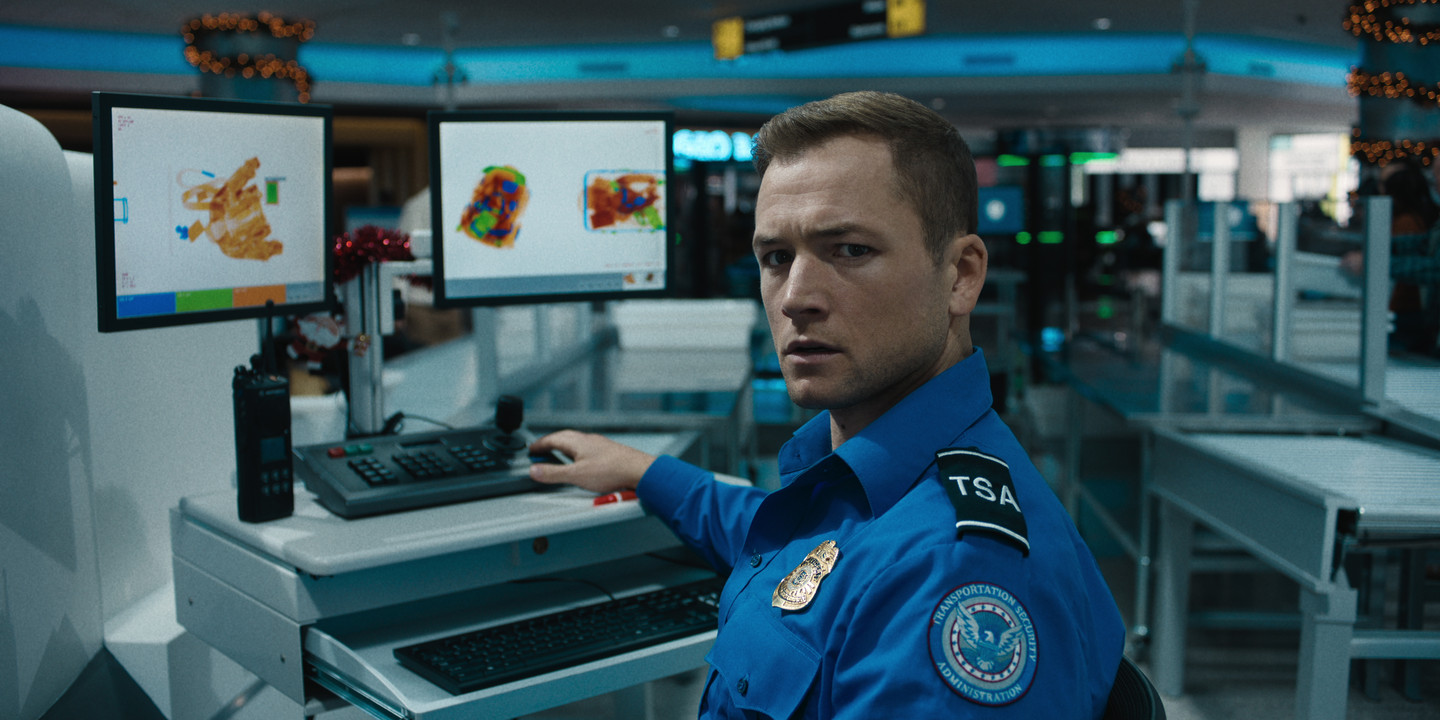 Carry-On - Taron Egerton in TSA Checkpoint Scene