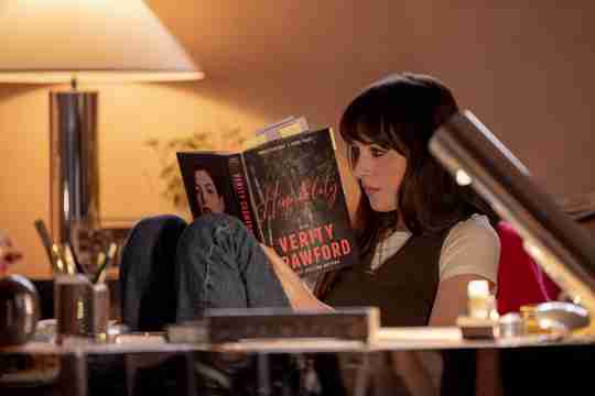 Verity - Dakota Johnson as Lowen Ashleigh Reading a Book