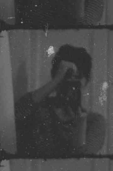 A Woman with a Movie Camera Poster