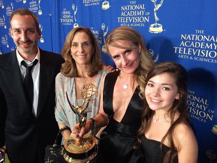 Rebekka Sorenson (second from right) with her 2014 Emmy award is joined by James Krieg (L), producer Jane Startz and actress Katie Douglas from Hub's "Spooksville"