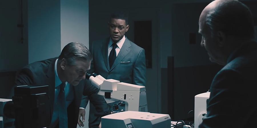 Alec Baldwin (left) and Will Smith (center) in 'Concussion'