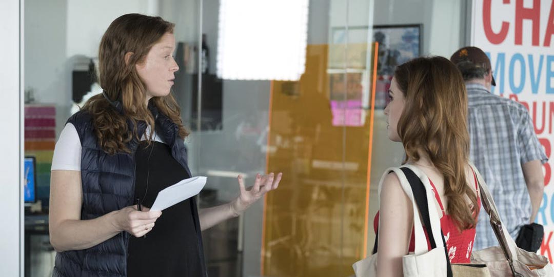 Director Clare Scanlon and Zoey Deutch on the set of 'Set it Up.'