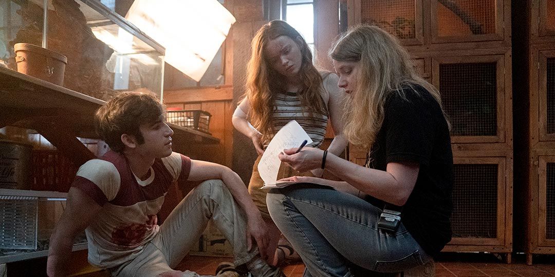 (L to R) Actors Ted Sutherland, Sadie Sink, and Leigh Janiak on the set of 'Fear Street Part 3: 1666'
