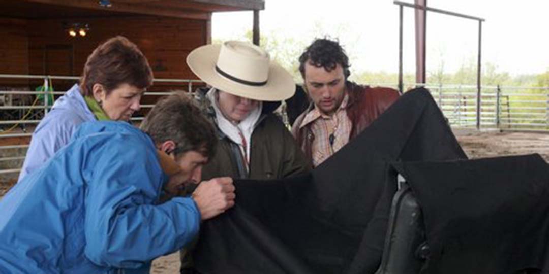 Director Cindy Meehl (center, with hat) working with her crew on 'Buck.'