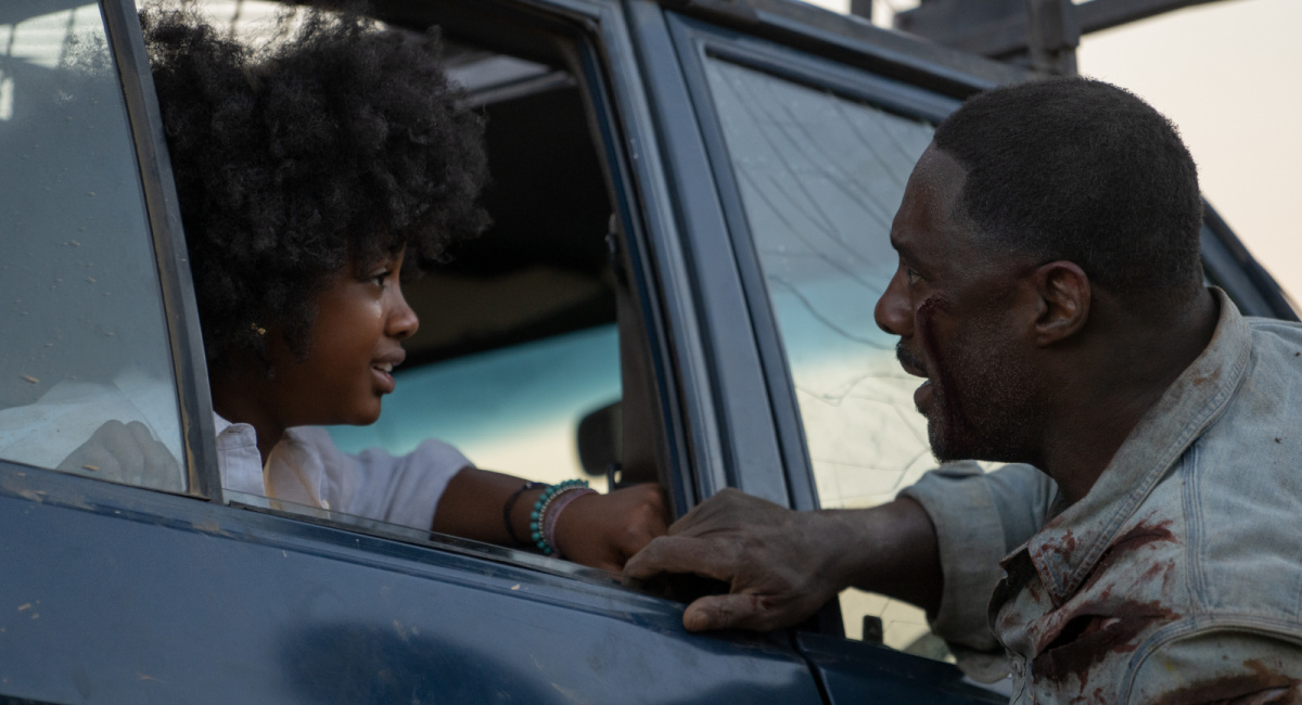 Leah Sava Jeffries and Idris Elba in 'Beast.'