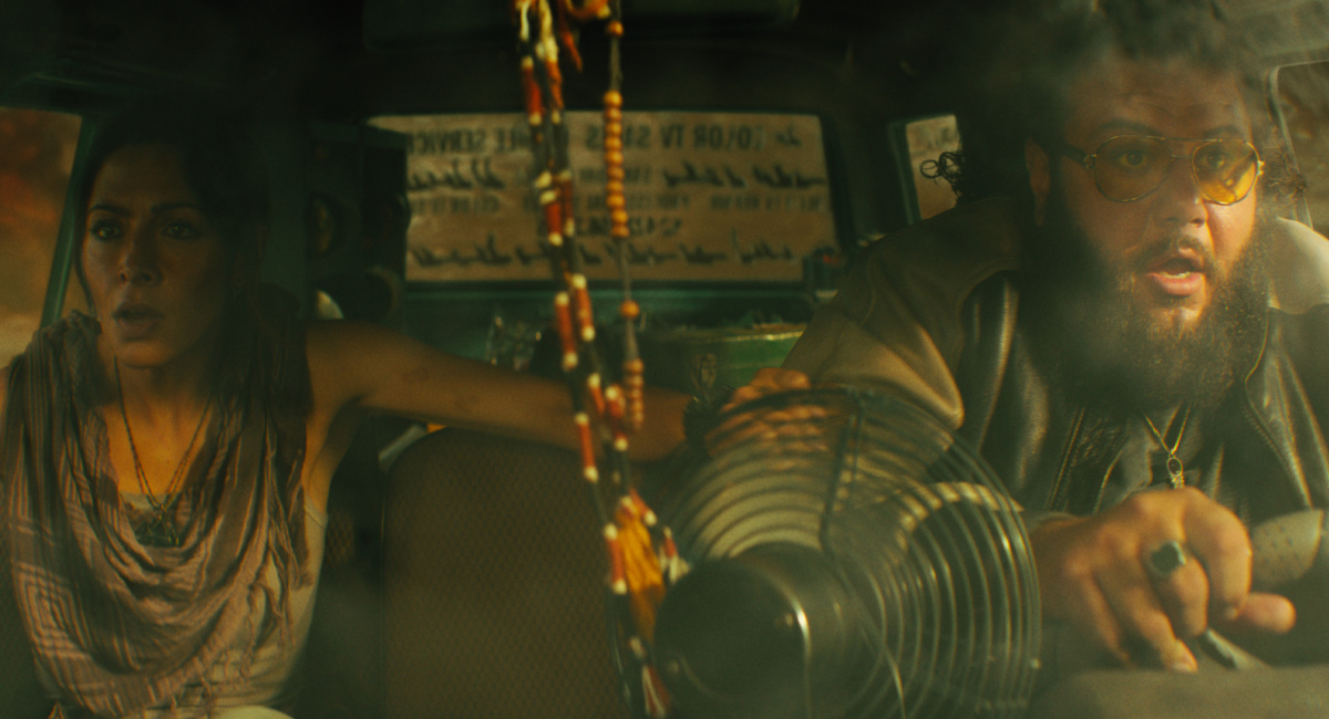 Sarah Shahi as Adrianna and Mohammed Amer as Karim in New Line Cinema’s action adventure 'Black Adam.'