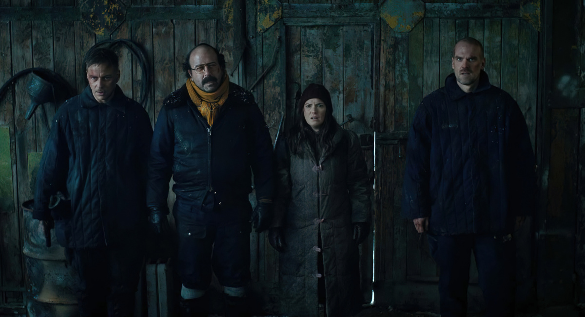 Tom Wlaschiha as Dmitrti, Brett Gelman as Murray Bauman, Winona Ryder as Joyce Byers, and David Harbour as Jim Hopper in 'Stranger Things.'