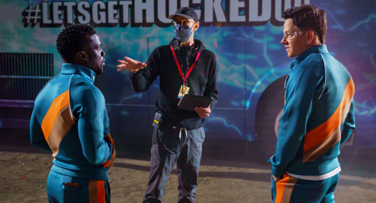 Kevin Hart as Sonny, director John Hamburg, and Mark Wahlberg as Huck on the set of 'Me Time.'