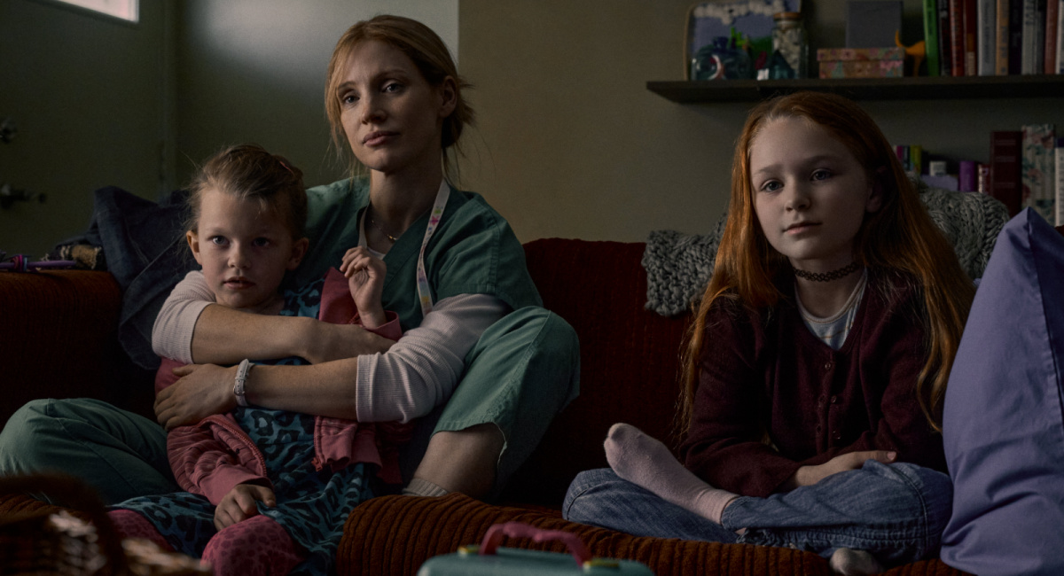 Jessica Chastain as Amy Loughren, Alix West Lefler, and Devyn McDowell in Netflix's 'The Good Nurse.'