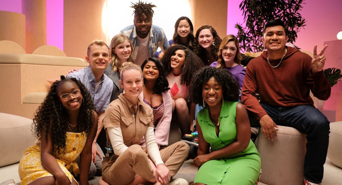 Director, Brie Larson (front, second from left), with Sophia, Gavin, Alex, Amiri, Athena, Sage, Isabel, Clare, Emily, David and Vanessa of Disney's 'Growing Up'.