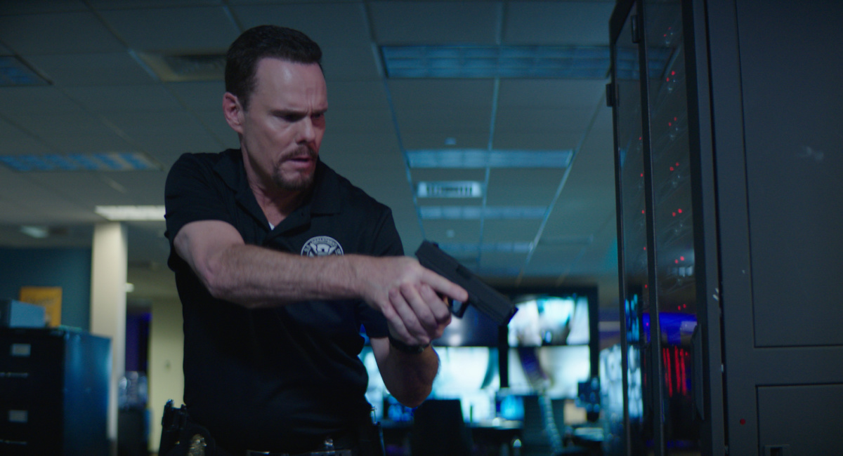 Kevin Dillon as Justin Rosa in the action film, 'Wire Room.'