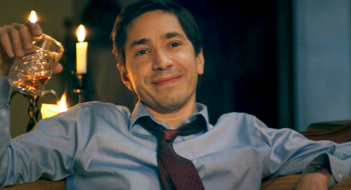Justin Long as Hap Jackson in the thriller 'House of Darkness'.