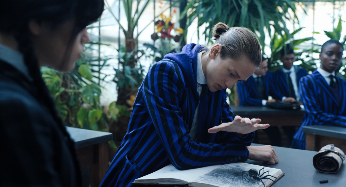 Jenna Ortega as Wednesday Addams, Percy Hynes White as Xavier Thorpe, Joy Sunday as Bianca Barclay in 'Wednesday.'