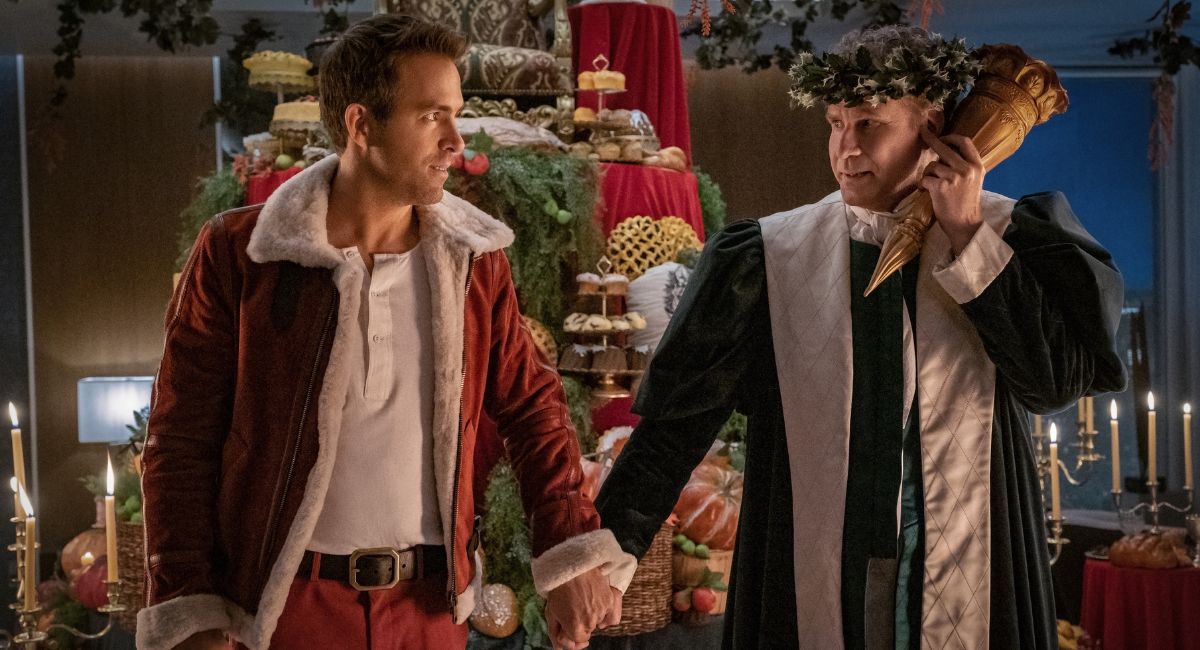 Ryan Reynolds as Clint Briggs and Will Ferrell as Present in Apple TV+'s 'Spirited.'