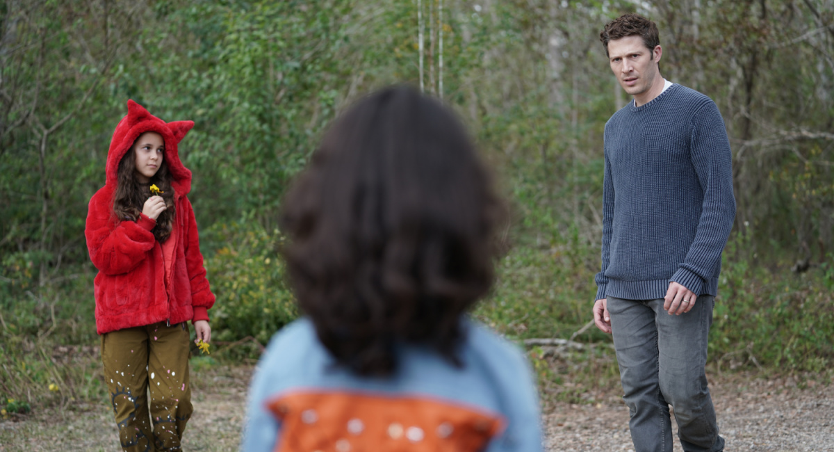 Briella Guiza as Lucy, David Mattle as Spencer, and Zach Gilford as Ben Winslow in 'There's Something Wrong With The Children.'
