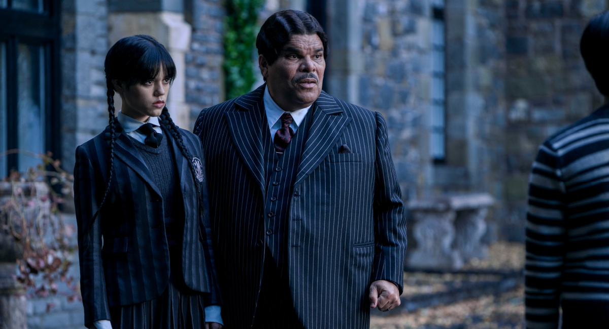 Jenna Ortega as Wednesday Addams, and Luis Guzmán as Gomez Addams in 'Wednesday.'
