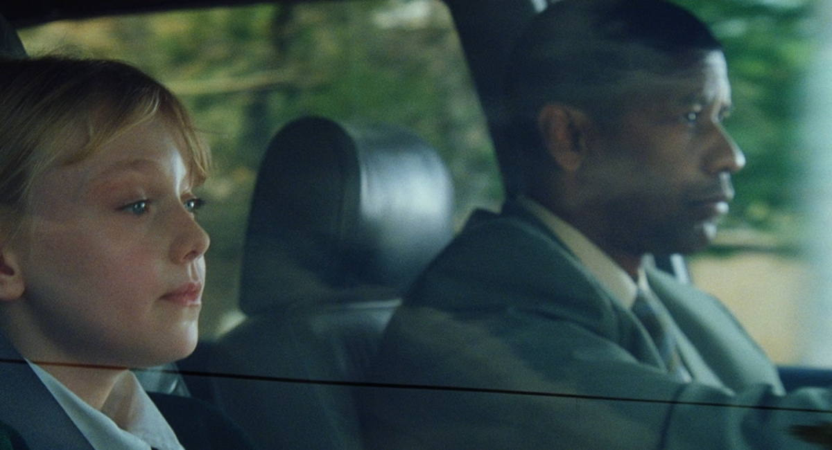 Dakota Fanning and Denzel Washington in director Tony Scott's 'Man on Fire.'