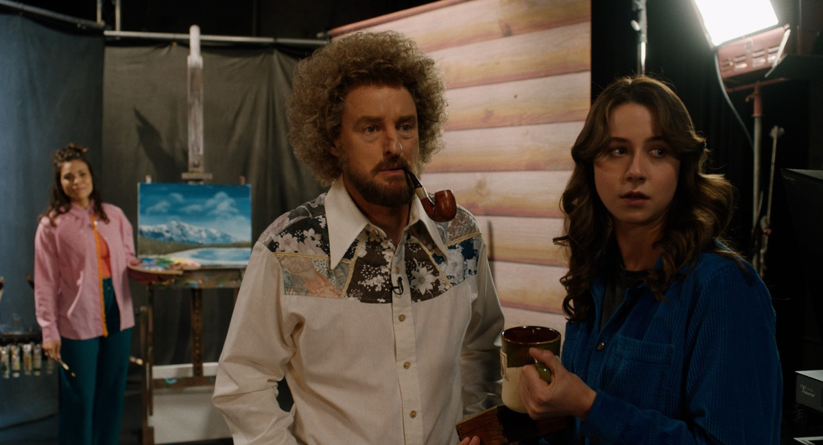 Ciara Renée as Ambrosia Long, Owen Wilson as Carl Nargle, and Lucy Freyer as Jenna in the comedy film, 'Paint,' an IFC Films release.