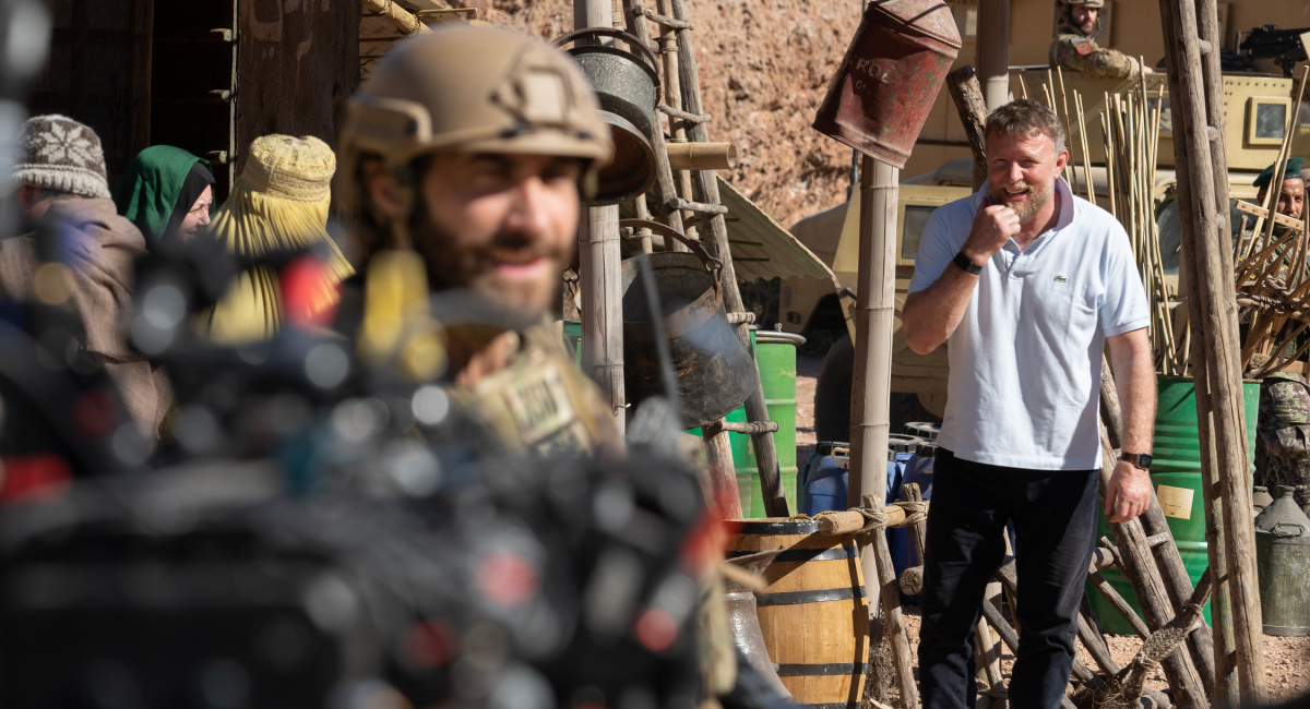 Actor Jake Gyllenhaal and director Guy Ritchie on the set of 'The Covenant.'