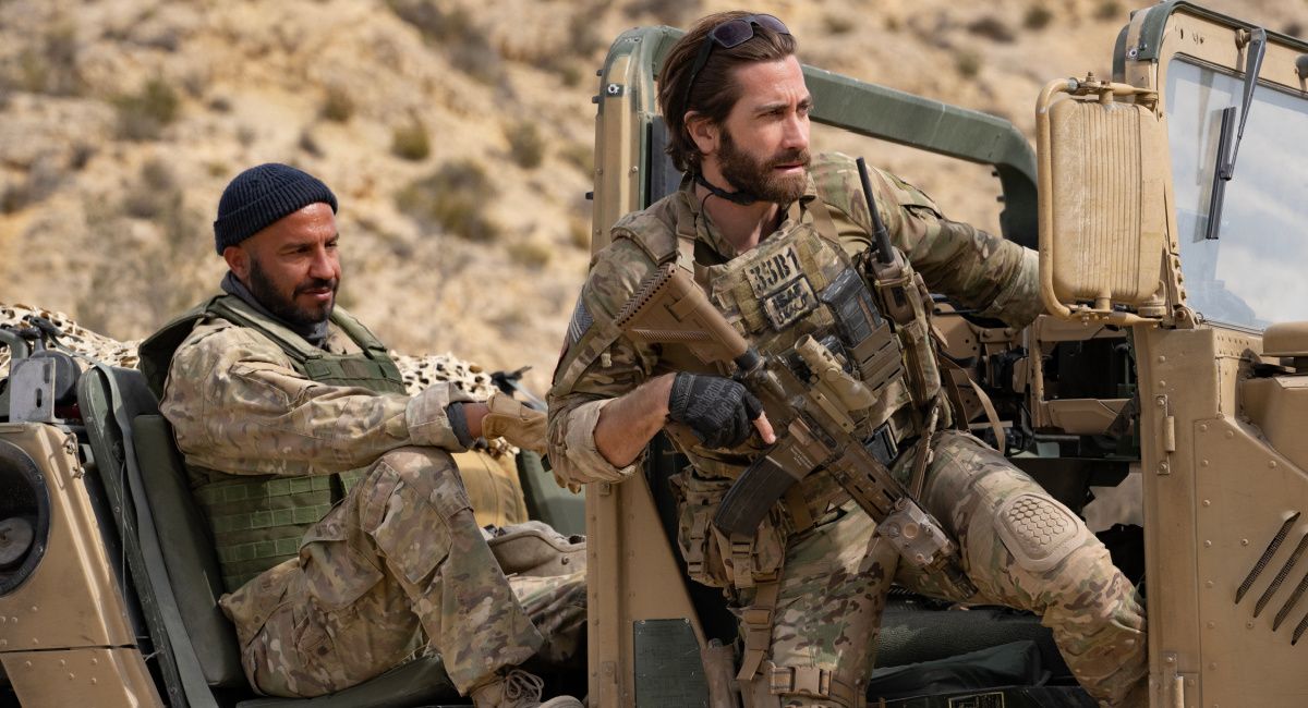 Dar Salim as Ahmed and Jake Gyllenhaal as Sgt. John Kinley in The Covenant.'