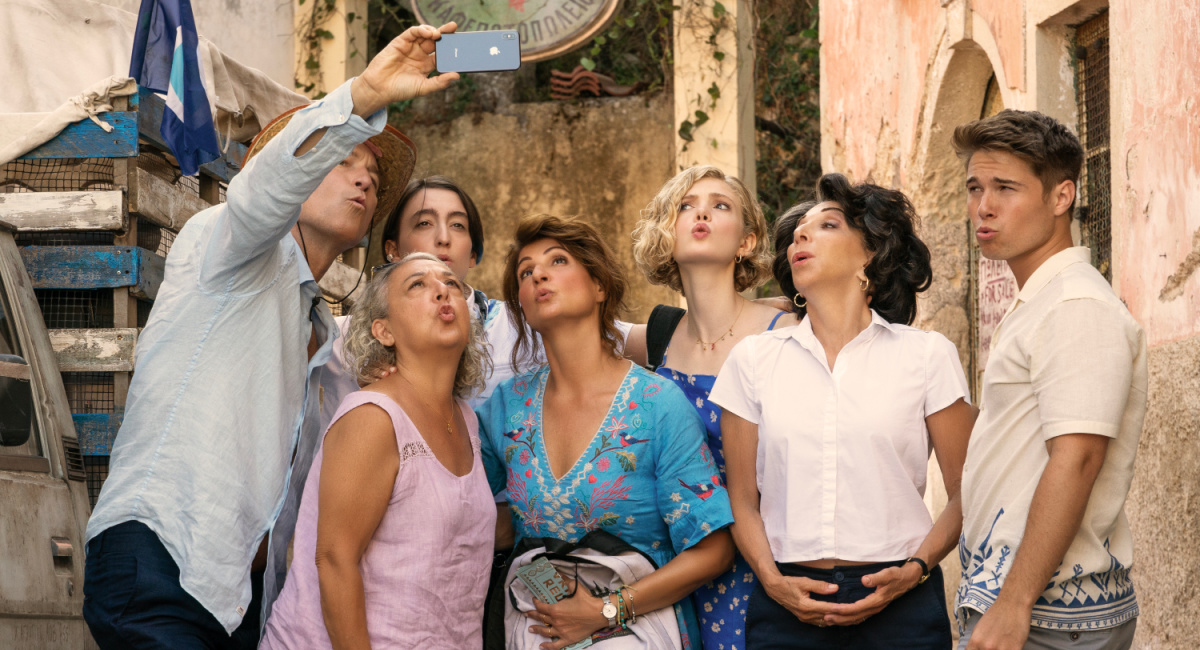 John Corbett as Ian, Maria Vacratsis as Aunt Frieda, Melina Kotselou as Victory, Nia Vardalos as Toula, Elena Kampouris as Paris, Andrea Martin as Aunt Voula, and Elias Kacavas as Aristotle in director Nia Vardalos' 'My Big Fat Greek Wedding 3,' a Focus Features release. Courtesy of Yannis Drakoulidis / Focus Features.