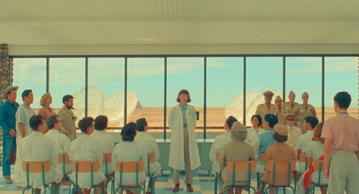 Rupert Friend as "Montana", Stephen Park as "Roger Cho", Hope Davis as "Sandy Borden", Jason Schwartzman as "Augie Steenbeck", Tilda Swinton as "Dr. Hickenlooper", Jeffrey Wright as "General Gibson", Tony Revolori as "Aide-de-Camp", Bob Balaban as "Larkings Executive", Mike Maggart as "Detective #2", Fisher Stevens as "Detective #1" in writer/director Wes Anderson's 'Asteroid City,' a Focus Features release.