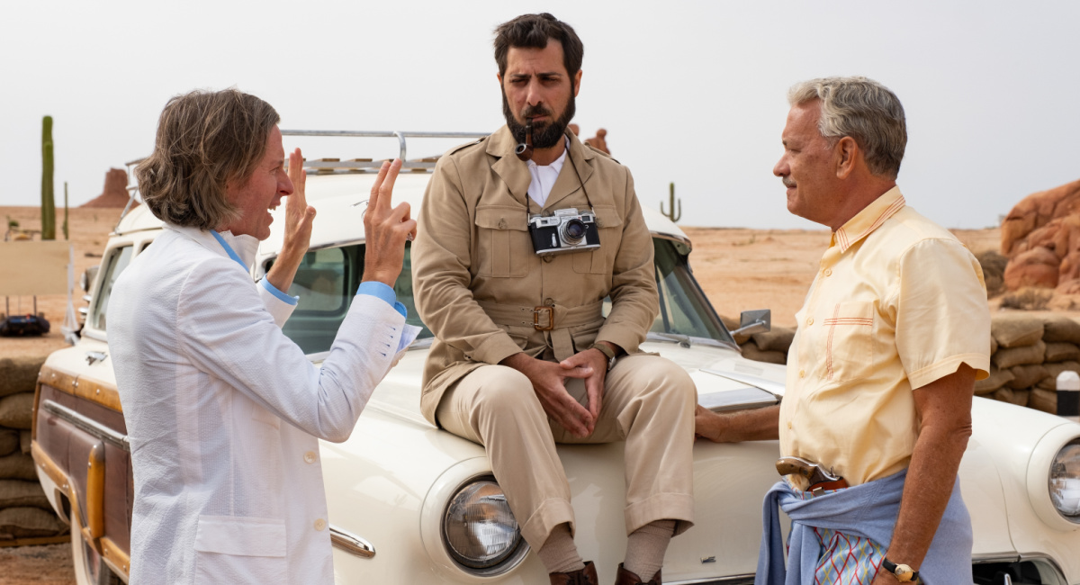 Writer/director Wes Anderson, actor Jason Schwartzman and actor Tom Hanks on the set of the film 