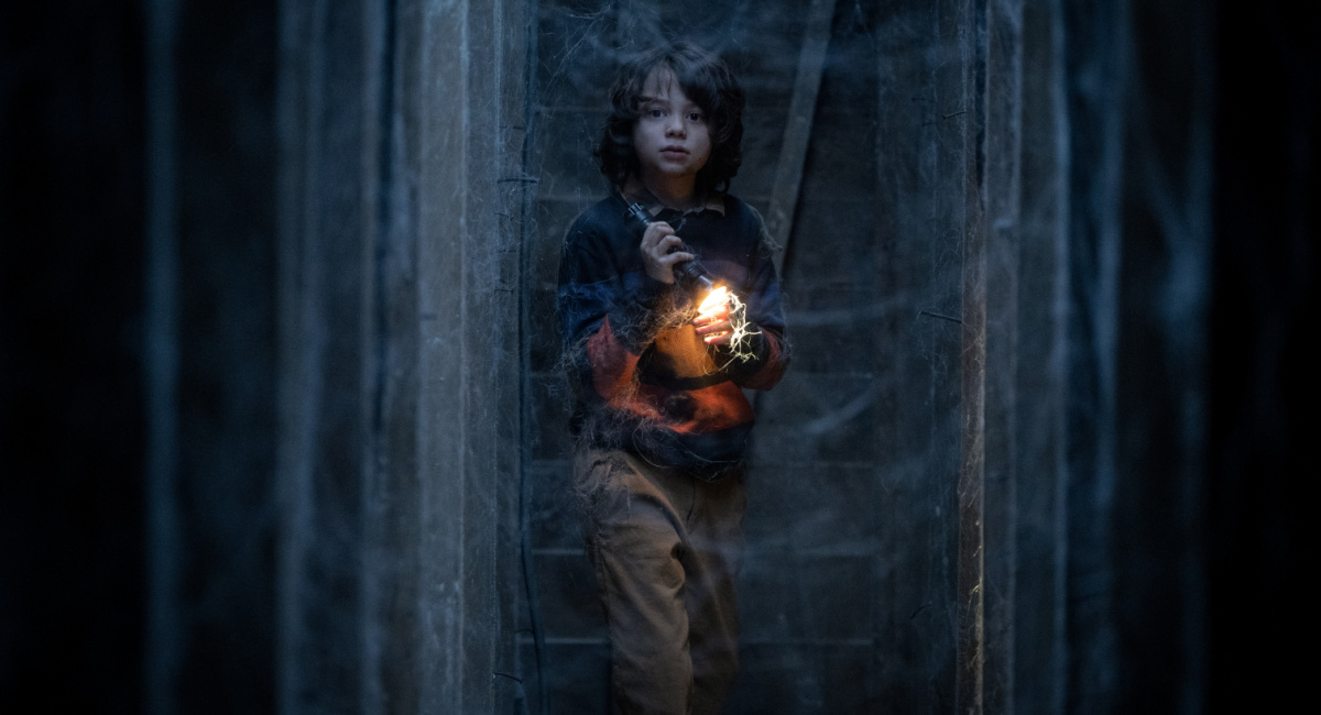Woody Norman as Peter in the Horror/Thriller film, 'Cobweb,' a Lionsgate release.