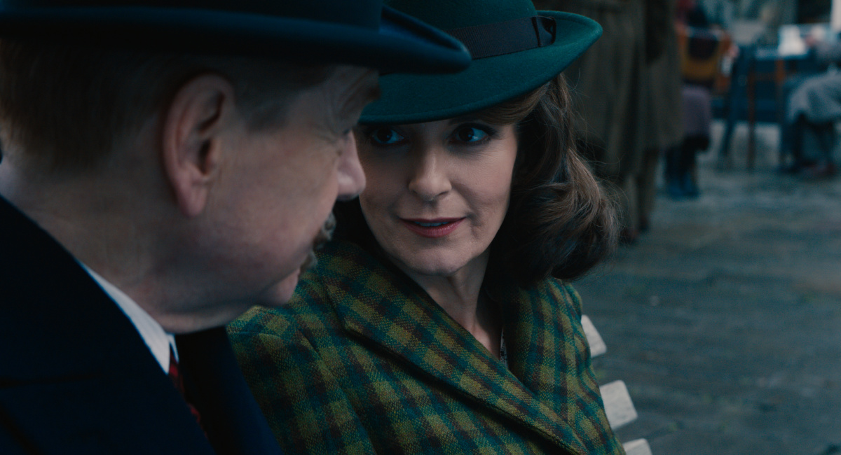 Kenneth Branagh as Hercule Poirot and Tina Fey as Ariadne Oliver in 20th Century Studios' 'A Haunting in Venice.'