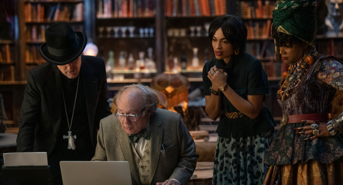 Owen Wilson as Father Kent, Danny DeVito as Bruce, Rosario Dawson as Gabbie, and Tiffany Haddish as Harriet in Disney's live-action 'Haunted Mansion.'