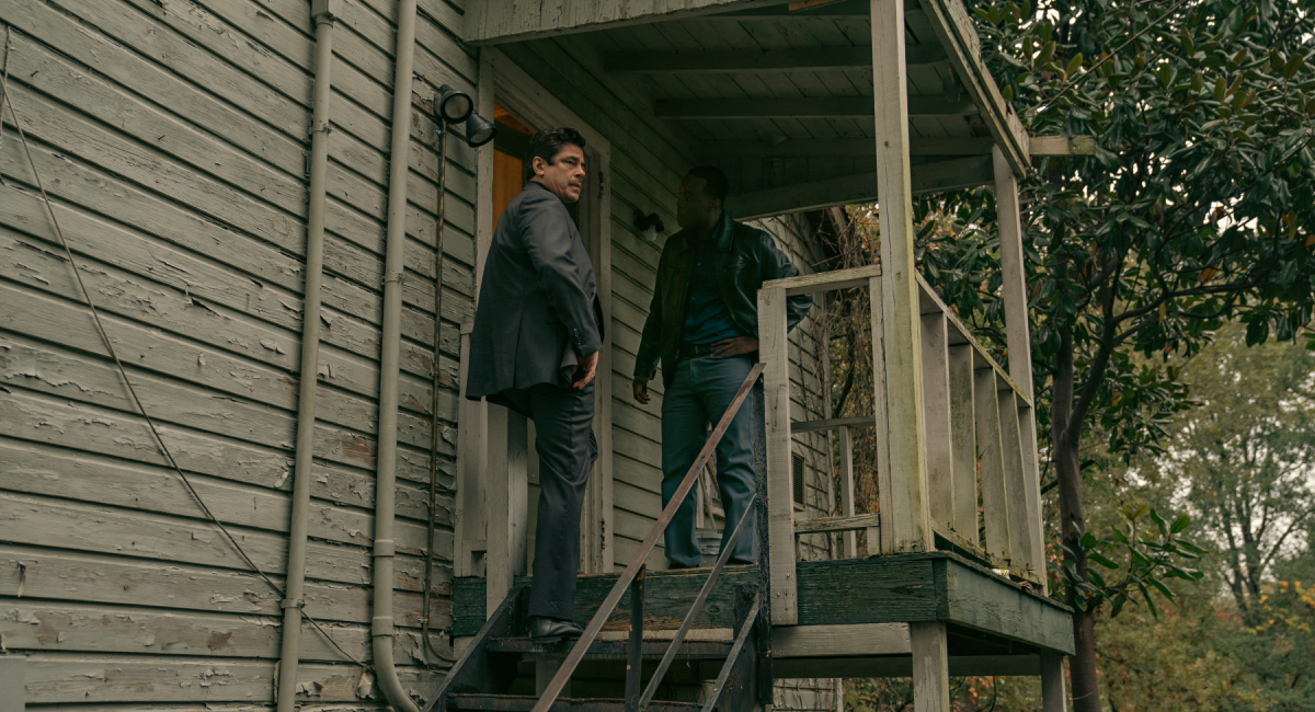 Benicio Del Toro as Tom Nichols and Ato Essandoh as Dan Cleary in 'Reptile.'