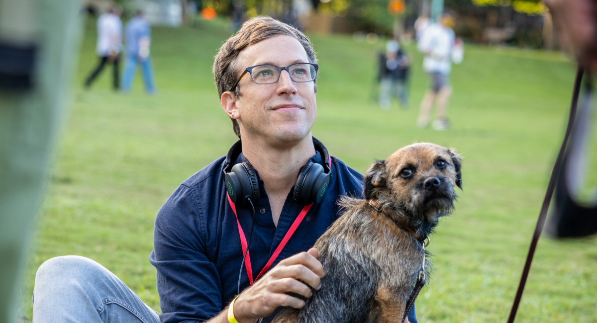 Director Josh Greenbaum with Reggie on the set of 'Strays.'