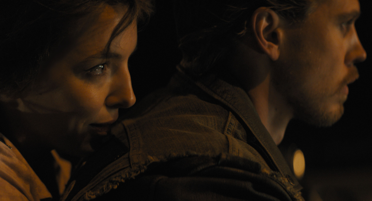 Jodie Comer as Kathy and Austin Butler as Benny in 20th Century Studios' 'The Bikeriders'.