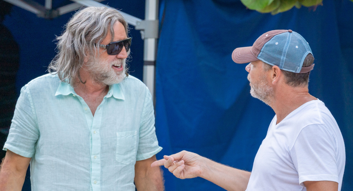 Nicolas Cage and director Tim Brown on the set of 'The Retirement Plan.'