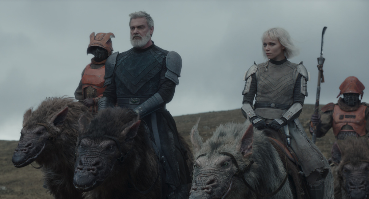 Baylan Skoll (Ray Stevenson) and Shin Hati (Ivanna Sakhno) with Peridea bandits and howlers in Lucasfilm's 'Star Wars: Ahsoka,' exclusively on Disney+.
