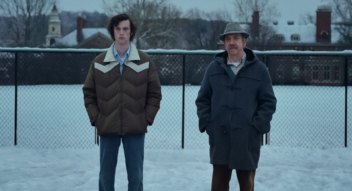 Dominic Sessa stars as Angus Tully and Paul Giamatti stars as Paul Hunham in director Alexander Penn's The Holdovers, a Focus feature release.