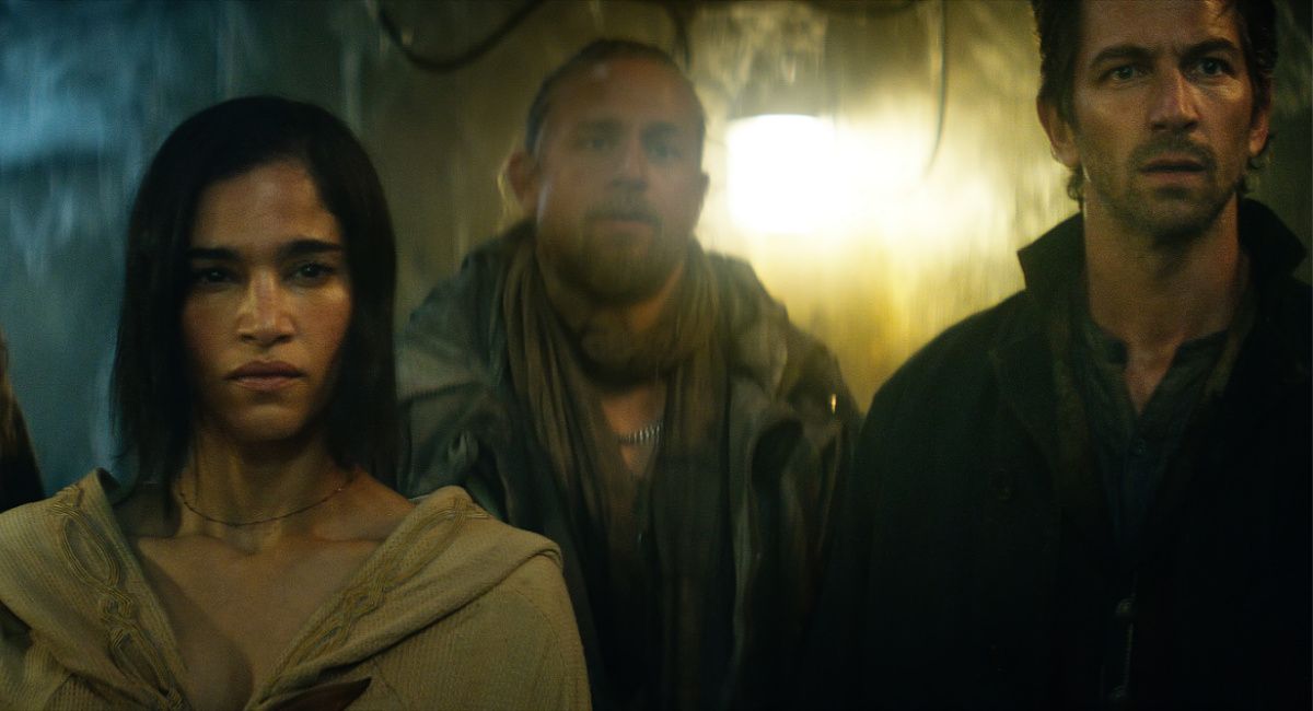 Staz Nair as Tarak, Sofia Boutella as Kora, Charlie Hunnam as Kai and Michiel Huisman as Gunnar in 'Rebel Moon.'