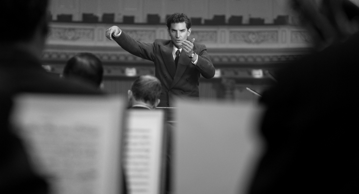 Bradley Cooper as Leonard Bernstein (Director/Writer/Producer) in 'Maestro.'