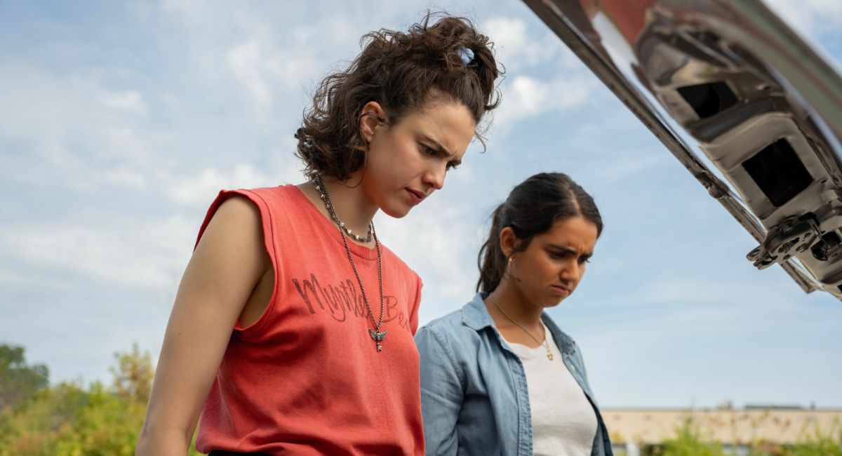 Margaret Qualley as "Jamie" and Geraldine Viswanathan as "Marian" in director Ethan Coen's 'Drive-Away Dolls,' a Focus Features release.