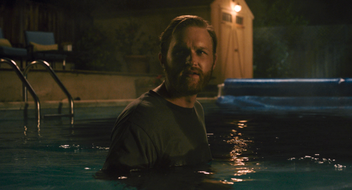 Wyatt Russell as Ray Waller in 'Night Swim,' directed by Bryce McGuire.