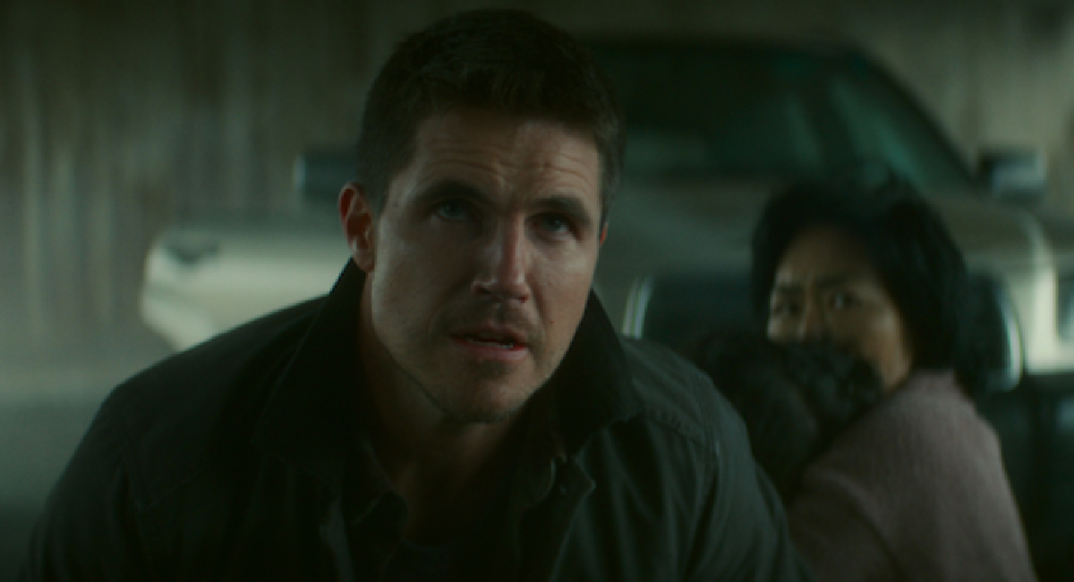 Robbie Amell as Connor, and Jean Yoon as Mina in 'Code 8: Part II.'