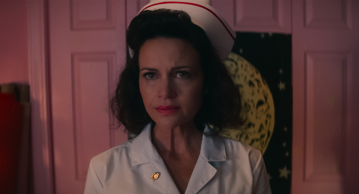 Carla Gugino stars as Janet in 'Lisa Frankenstein,' a Focus Features release.