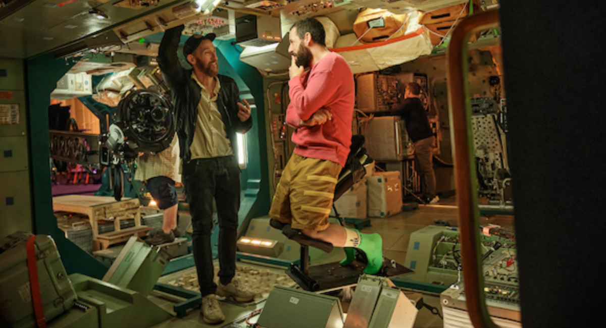 Johan Renck (Director) and Adam Sandler as Jakub on the set of 'Spaceman.'