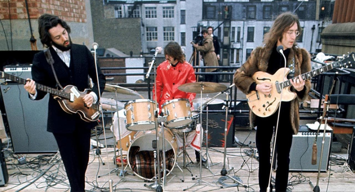 Paul McCartney, Ringo Starr, and John Lennon in 'The Beatles: Get Back - The Rooftop Concert.'
