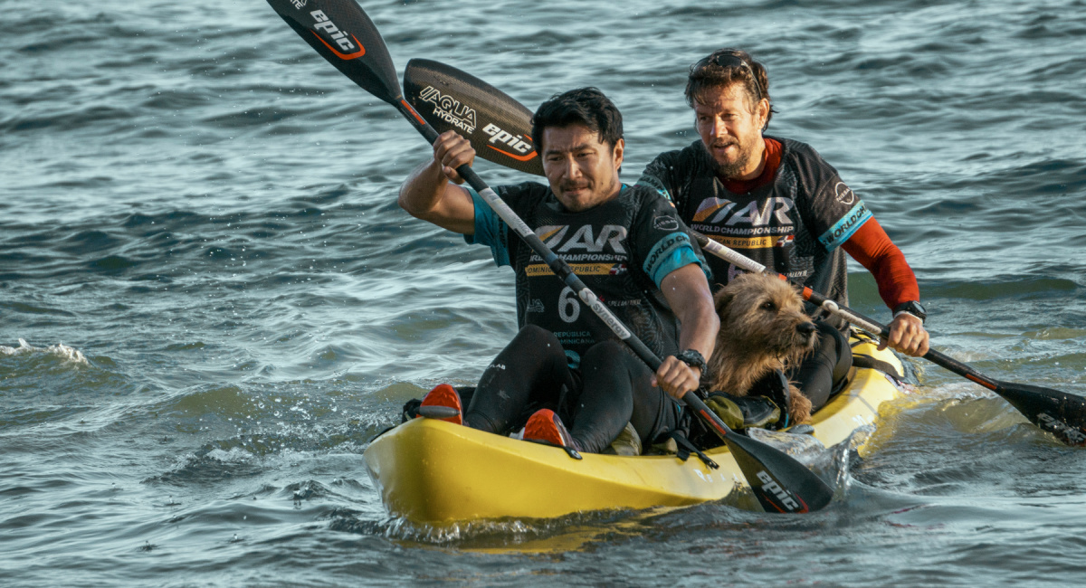 Simu Liu as Leo and Mark Wahlberg as Michael in 'Arthur The King.'